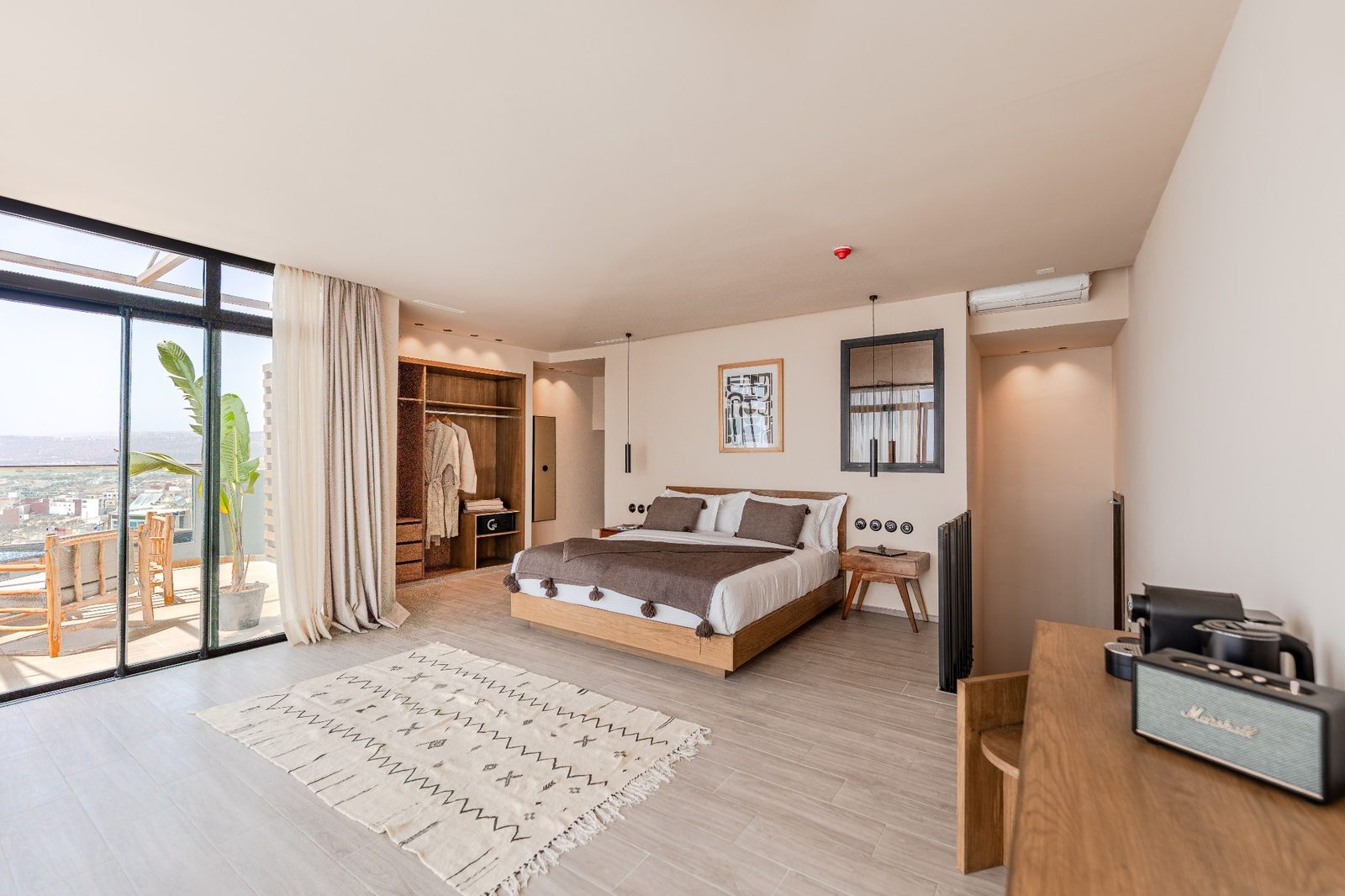 The sleeping area of the Suite Royale opening onto its terrace