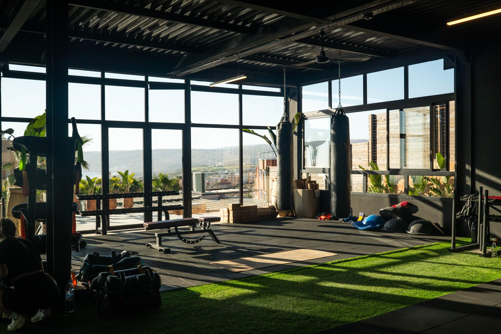 The gym floor at Nobi near Taghazout, turf lane and the glazed wall