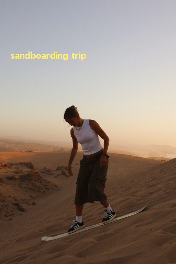 Sandboarding on the dunes near Tamraght