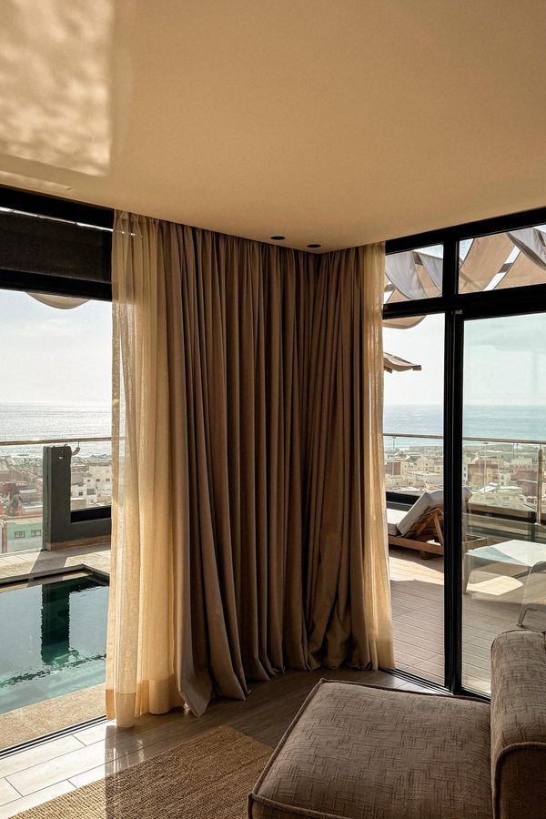 A room looking out over the coast