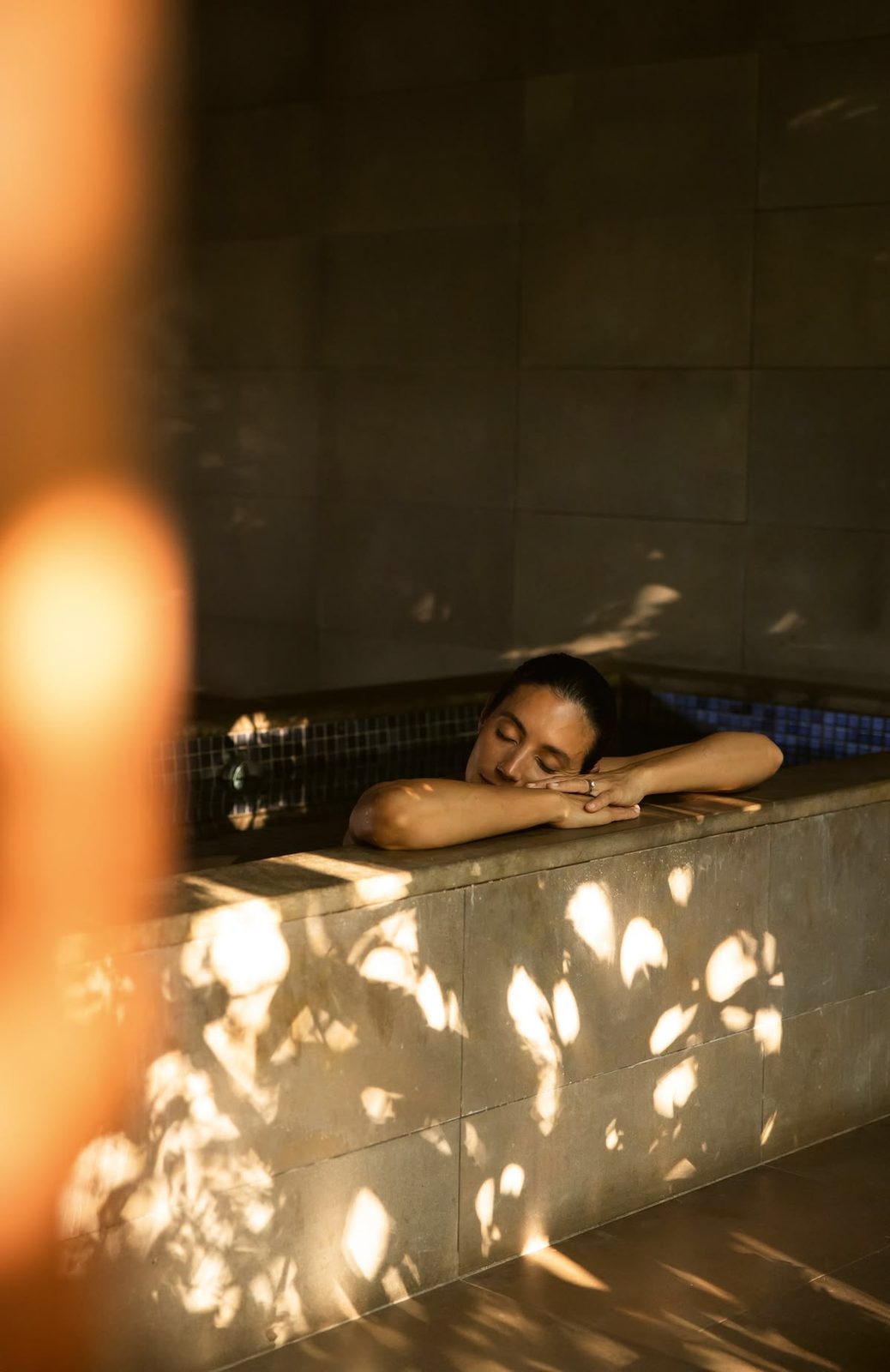 Resting at the pool edge in the afternoon light